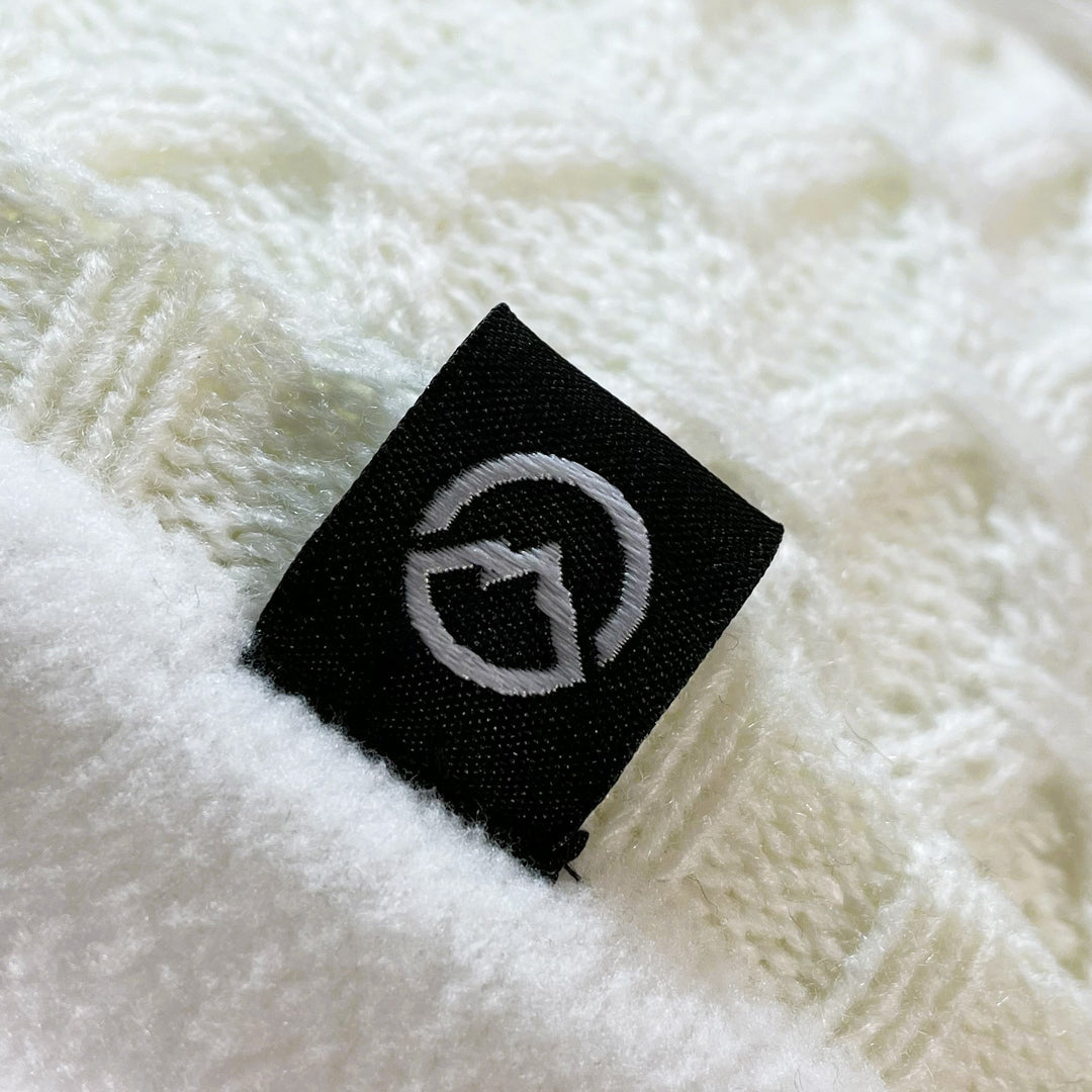 Close up of Domex logo on Honeycomb-knit cuffless beanie - white | DOMB1065