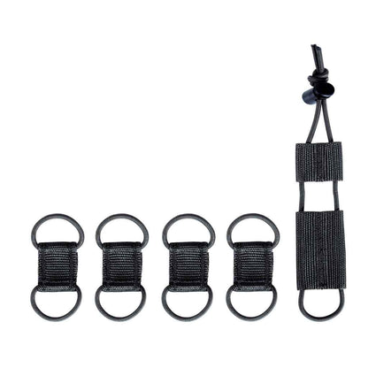 Flat lay of Tasmanian Tiger cable manager set consisting of four attachment elements for radio equipment and cables and one tourniquet  - Black 