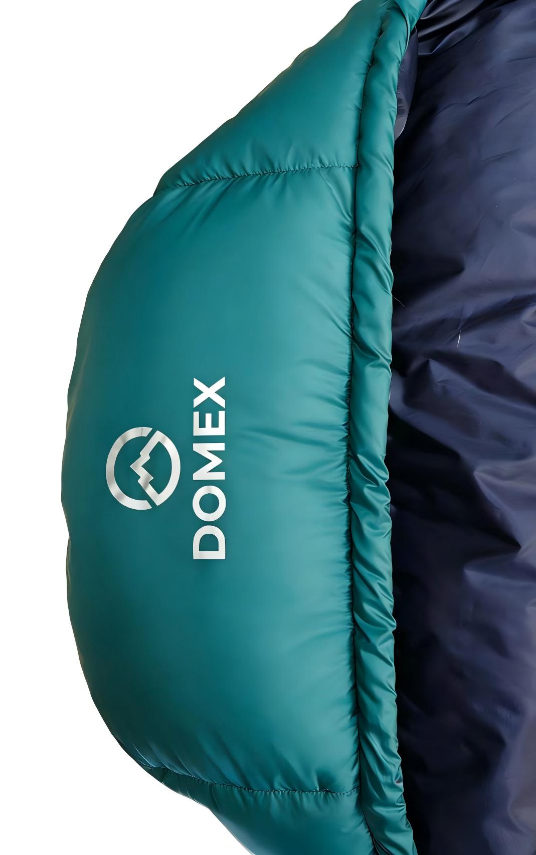 Close up of logo on hood of Domex Wanderer 300 - 2-season down bag - teal with blue lining | GENERAL
