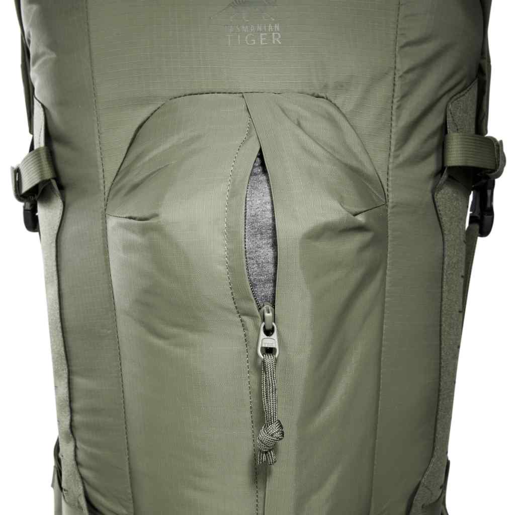 Close up of front pocket on 28 litre Tasmanian Tiger sentinel pack partially unzipped - Olive | TT7353.331
