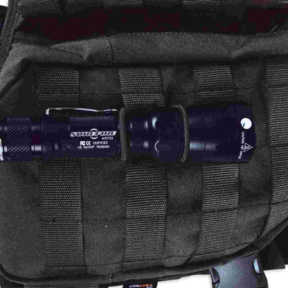 Close up of cable manager  in Molle system holding torch in place  - Black 