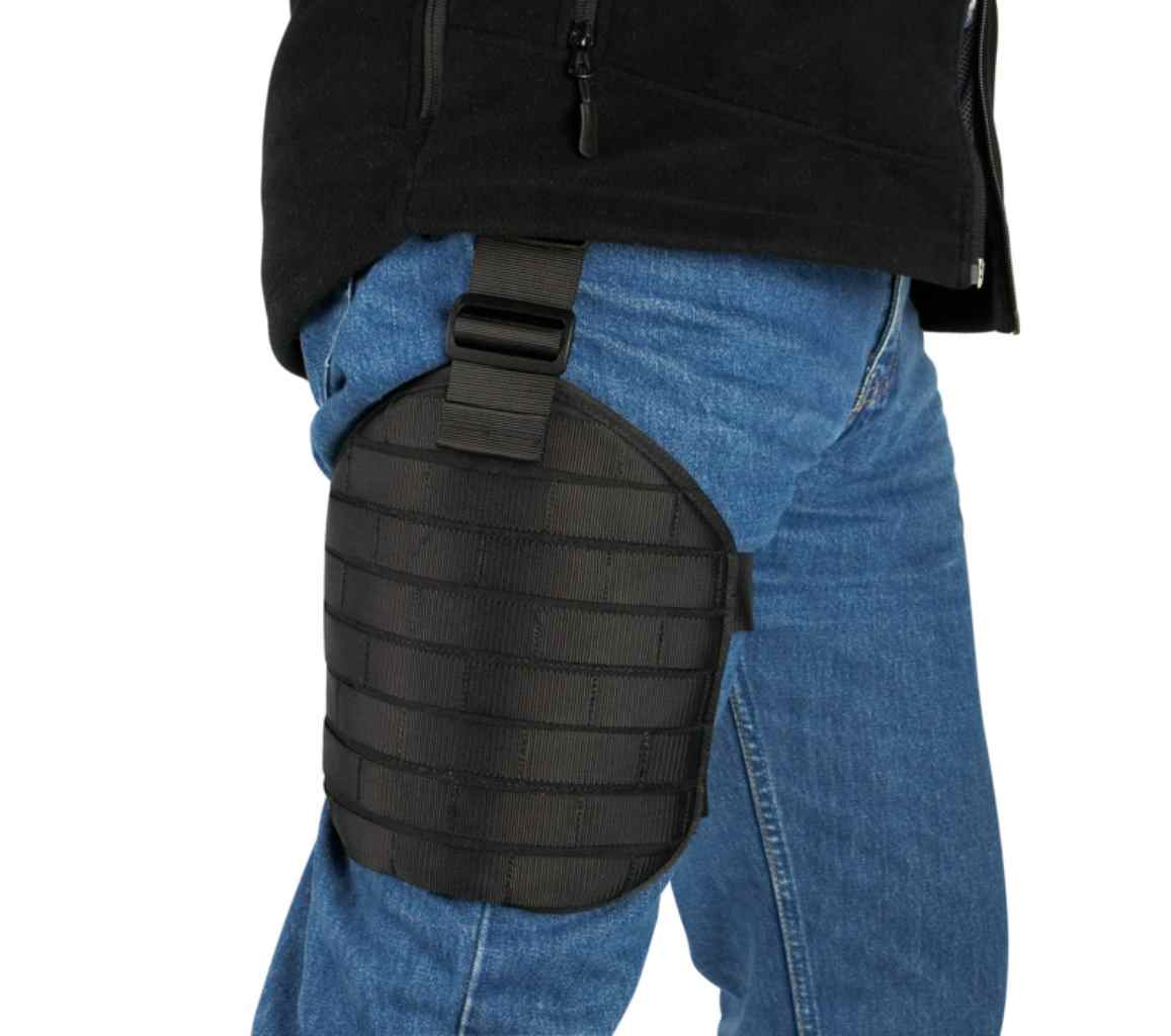 Tasmanian Tiger Leg Base with rigid Molle system plate, loop at the top to fix to your waist belt and two adjustable leg straps shown being worn – Black | TT7674.040