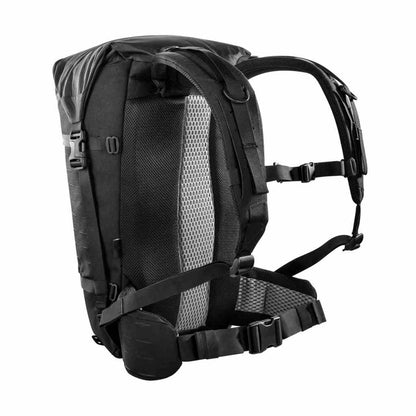 Three quarter back view of 28 litre Tasmanian Tiger Sentinel pack featuring roll-top with zipper and laser-cut MOLLE on sides and removable padded hip fins - Black | TT7353.040