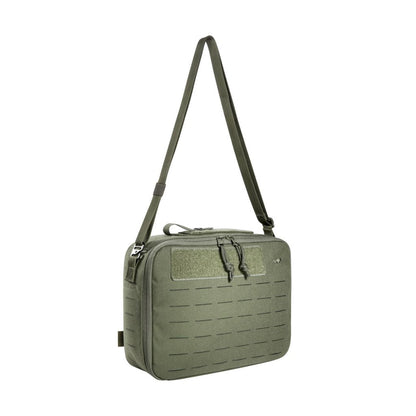 Three quarter front view of Tasmanian Tiger modular zip closed support bag, with laser-cut MOLLE on the front and sides. Shoulder strap is removable and stowable - Olive. Ships Within New Zealand | TT7759.331