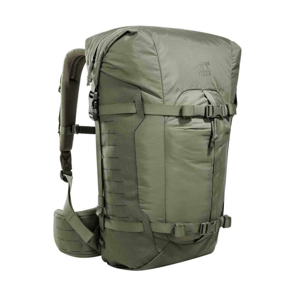 Three quarter front view of 28 litre Tasmanian Tiger Sentinel pack featuring two compression straps, front pocket, roll-top with zipper and laser-cut MOLLE on sides - Olive | TT7353.331