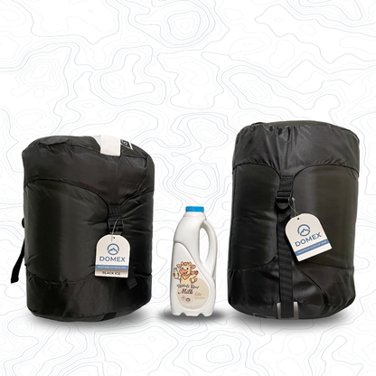 Scale image of Black Ice sleeping bag on left of 1 litre bottle of milk and Black Ice XL on the right | GENERAL