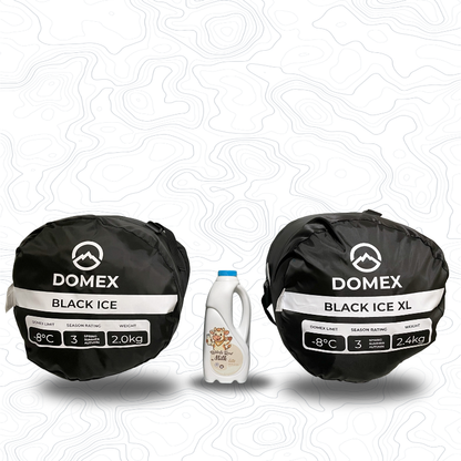 Scale image of Black Ice sleeping bag on left of 1 litre bottle of milk (showing -8C and 2.0kg) and Black Ice XL on the right (showing -8C and 2.4kg) | GENERAL