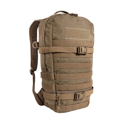 Three quarter front view of Tasmanian Tiger 15 litre daypack with small, flat zipped front pocket. It features two wraparound compression straps and a MOLLE system on the front and sides for individual expansion – Coyote Brown | TT7595.346