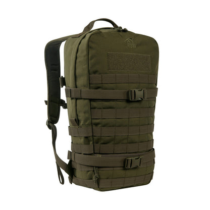 Three quarter front view of Tasmanian Tiger 15 litre daypack with small, flat zipped front pocket. It features two wraparound compression straps and a MOLLE system on the front and sides for individual expansion – Olive. Ships Within New Zealand | TT7595.331