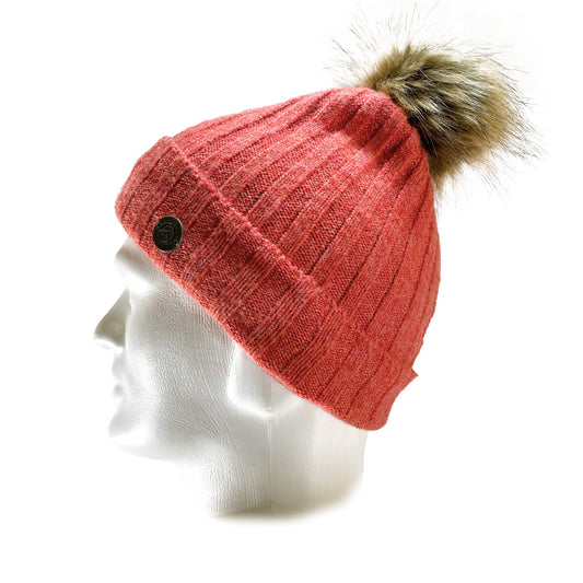 Side view of Domex Pink thick rib-knit cuffed beanie with fluffy faux-fur accent pom pom | Ships Within New Zealand